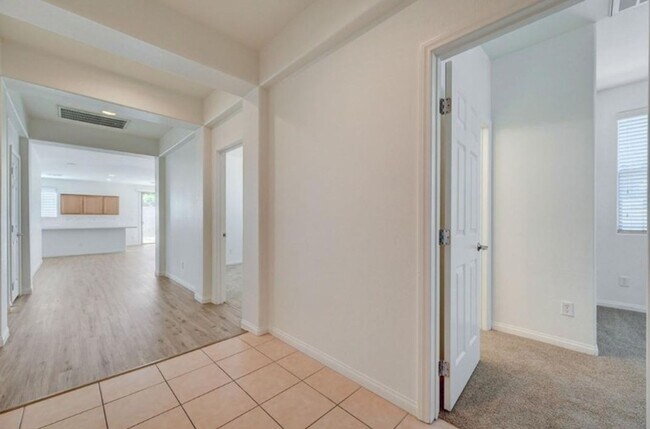 Building Photo - BEAUTIFUL 4 BEDROOM HOME IN GUARD GATED COMMUNITY!