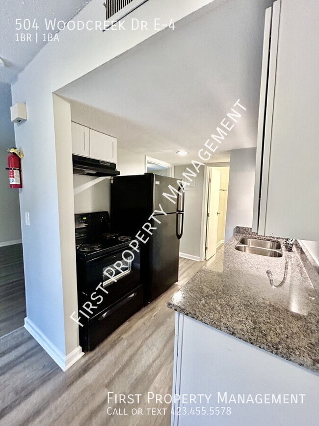 Building Photo - 504 Woodcreek Dr
