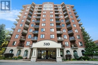 Building Photo - 310-310 Central Park Dr