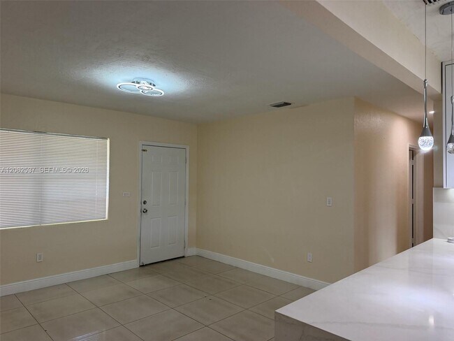 Building Photo - 9016 NW 35th Ct