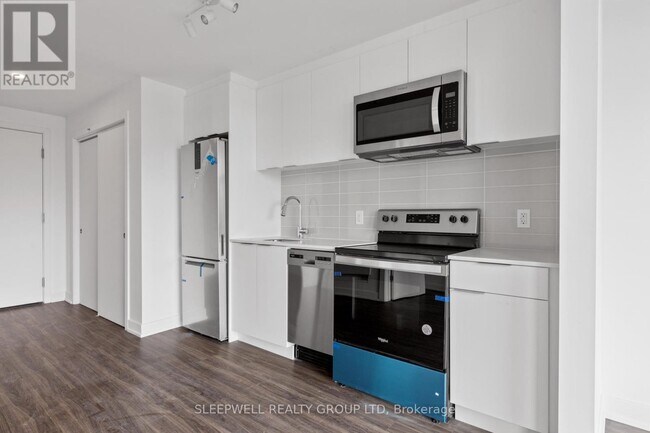 Building Photo - 1360 Carling Ave