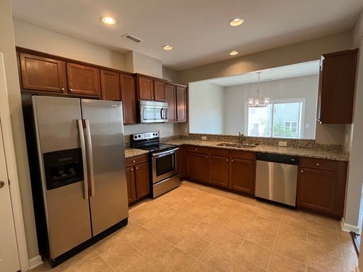 Foto del edificio - **OFFERING REFUNDABLE APPLICATION FEES** Fantastic 3BD, 2.5BA North Raleigh Townhome with Fenced ...