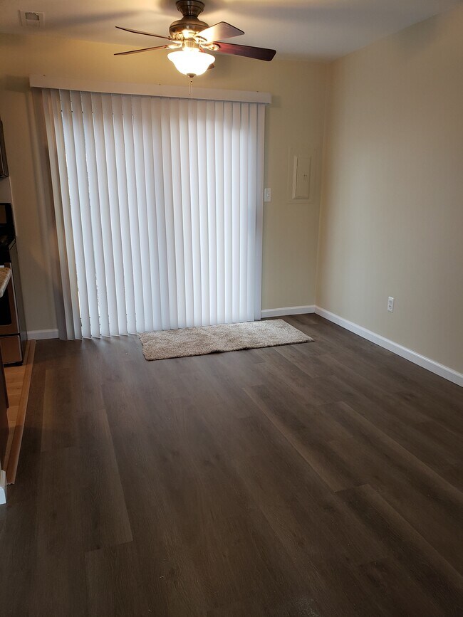 Dining Room with ceiling fan - 41235 S Woodbury Green Dr