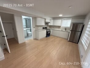 Building Photo - 20515-20570 70 Ave