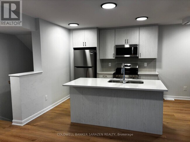 Photo du bâtiment - 701 Glenroy Gilbert Dr