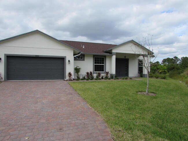 Building Photo - 6216 NW Gatun Court