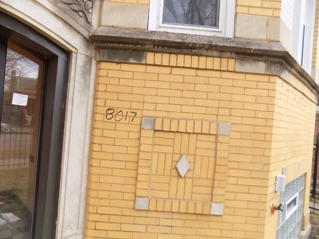 . - 8015-8017 S Ellis Ave