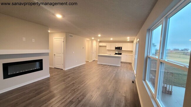 Foto del edificio - Contemporary Comfort: A Four-Bedroom Haven with Modern Flourish w/ 3 CAR GARAGE