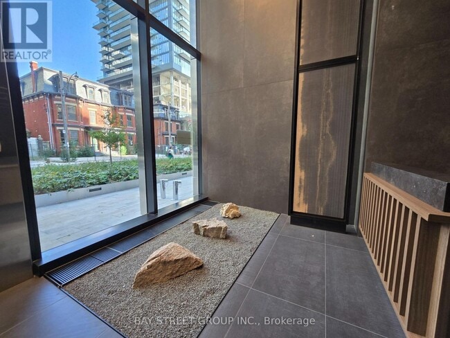 Building Photo - 55 Charles St E