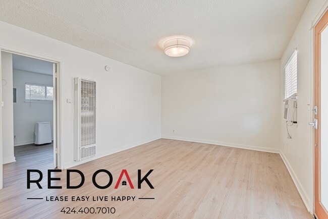 Foto del edificio - Breathtaking One Bedroom with Modern Light...