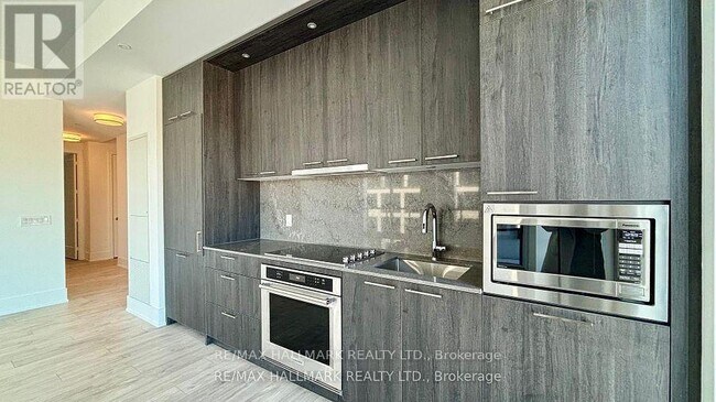 Photo du bâtiment - 115 Denison Ave