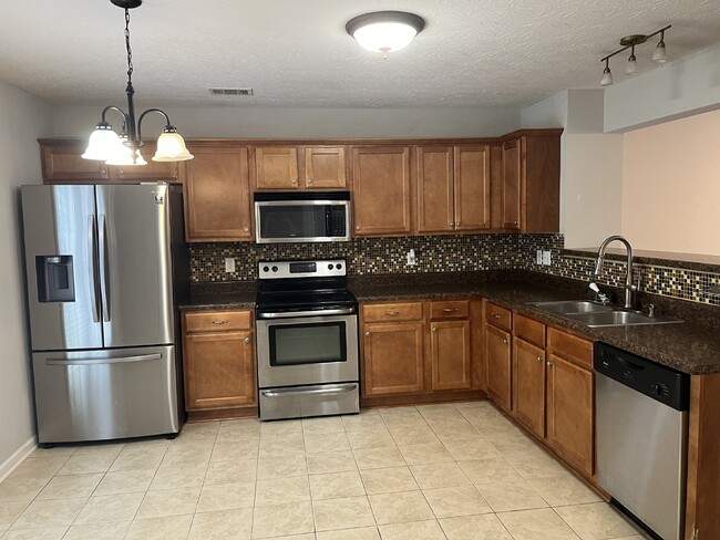 Building Photo - ONE MONTH OF FREE RENT!  "Charming 2-Bed, ...