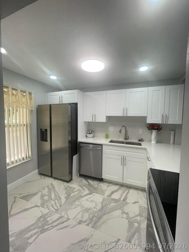Building Photo - 5980 NW 64th Ave