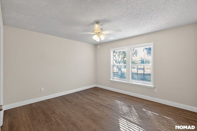 Building Photo - Modern 3BR Rental with Gated Yard, Garage & Prime San Antonio Location