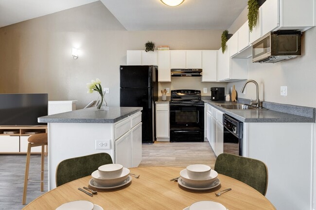 Kitchen with Island Storage - PeakView at T-Bone Ranch Apartments