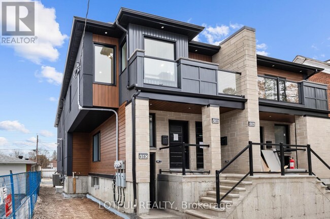 Building Photo - 461 Tweedsmuir Ave