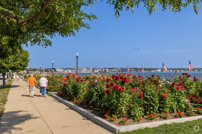 The Gloucester Fishermen's Wives Memorial along the water is lined with beautiful flowers.