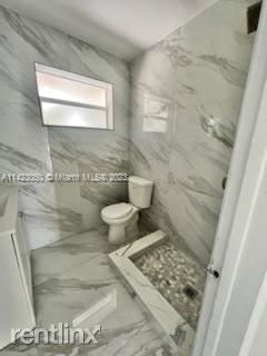 Building Photo - 2 br, 1 bath Duplex - 4265 SW 51st St