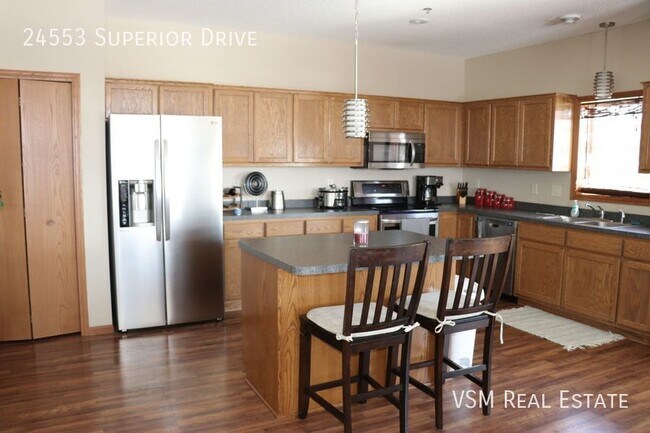 Building Photo - Modern 3BR Home with Wrap-Around Porch in ...