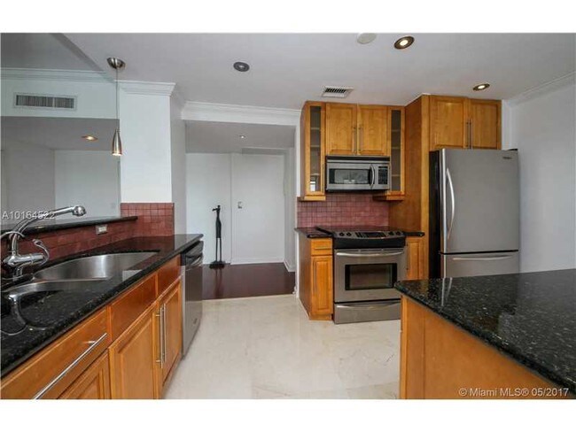 Foto del edificio - 9100 W Bay Harbor Dr