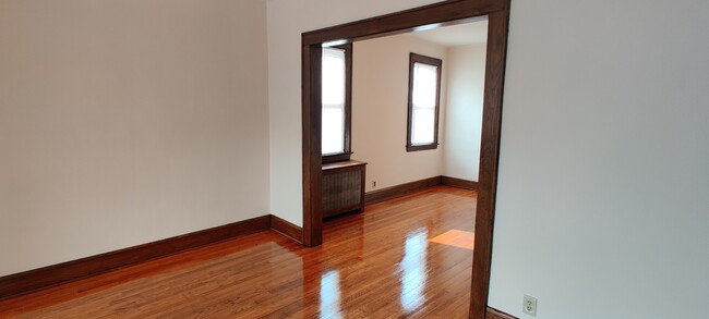 4. View from Living Room: Dining Room - 1114 S Long Ave