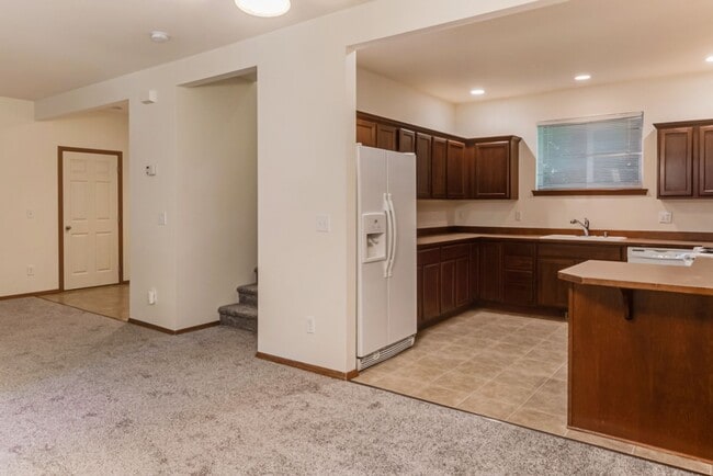 Building Photo - 3 Bedroom, 2.5 Bath with a 2-Car Garage in...