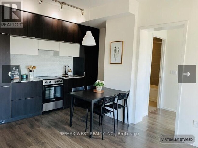 Photo du bâtiment - 159-3159 Dundas St E