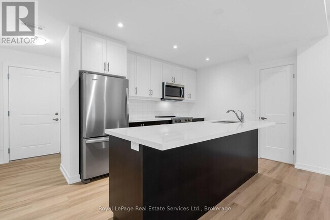 Photo du bâtiment - 70 Kenesky Dr