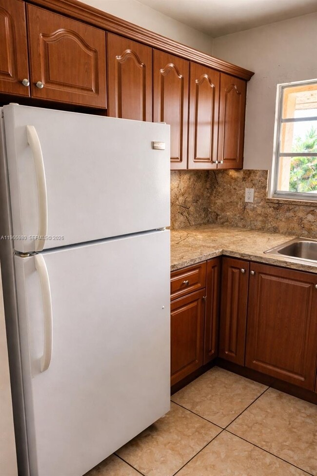 Building Photo - 6850 W 14th Ct