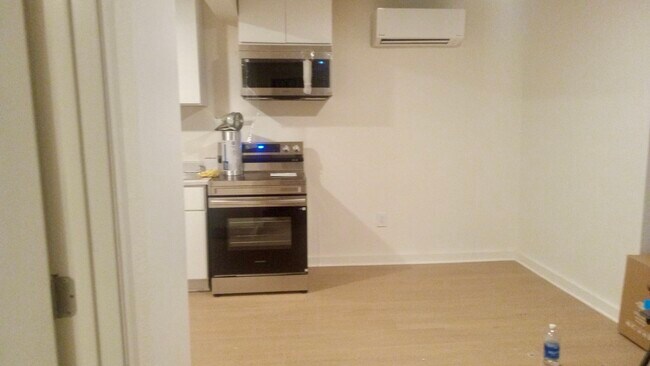 dining room with mini split - 690 W 8th St