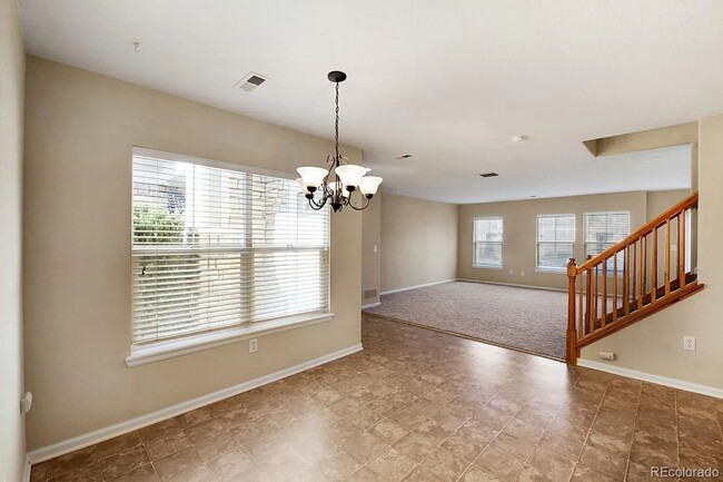 Building Photo - Bright Open-Concept Condo with 1-Car Garage in Prime Commuter Location