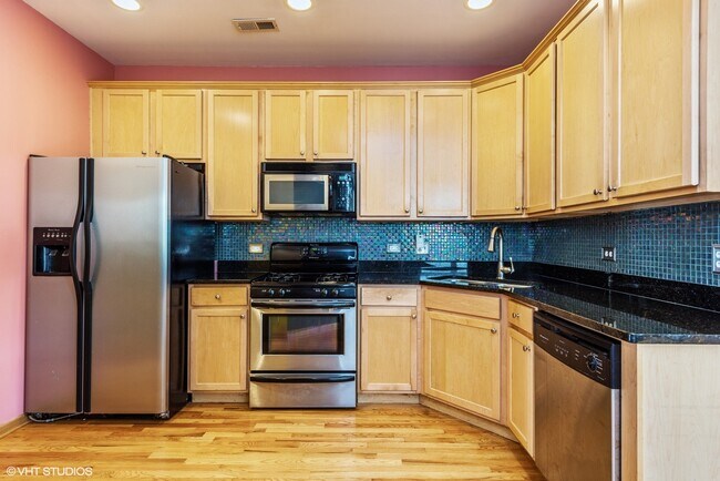 Building Photo - 4318 S Evans Ave