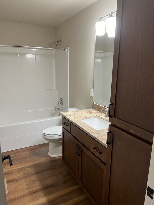 Granite countertops and full bath/shower - 6121 NE 195th Pl