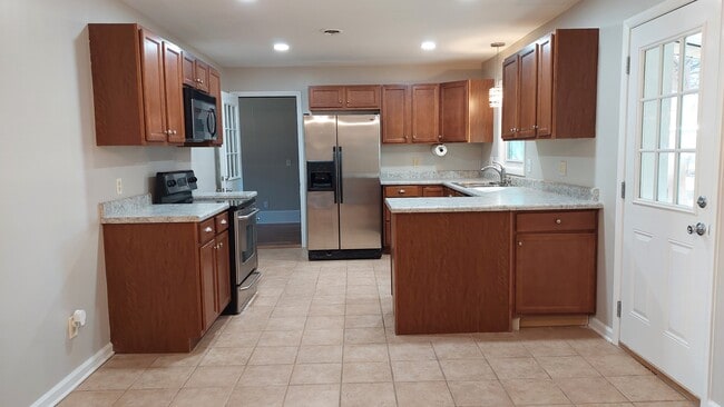 Spacious, open-concept kitchen - 611 Ambrose Dr
