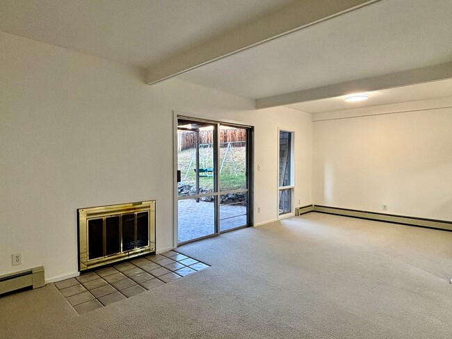 Building Photo - Updated 3BR Evergreen Home w/ Garage & Fenced Yard