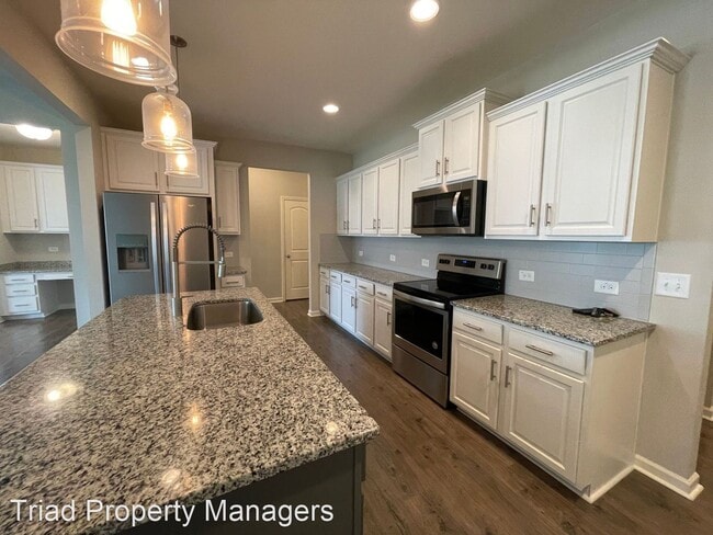 Building Photo - 3 br, 2.5 bath House - 713 Wrenn Miller St.