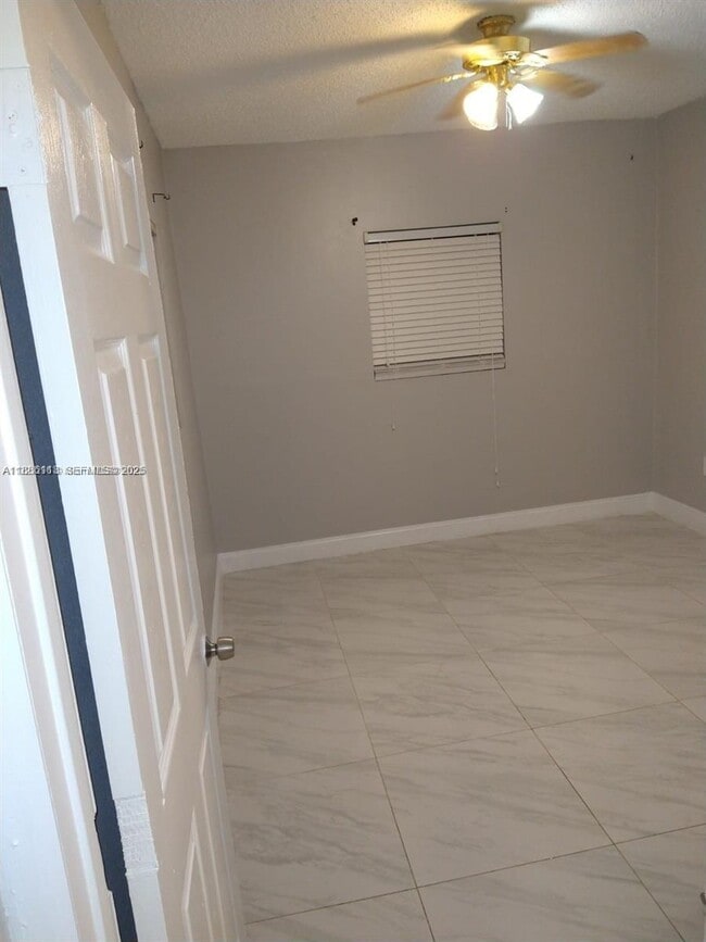 Building Photo - 1275 NW 58th Ave