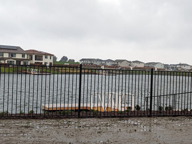 Backyard lake view - 16020 Duggar Dr