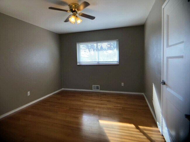Bright bedrooms with hardwood floors! - 2730 S Utica St