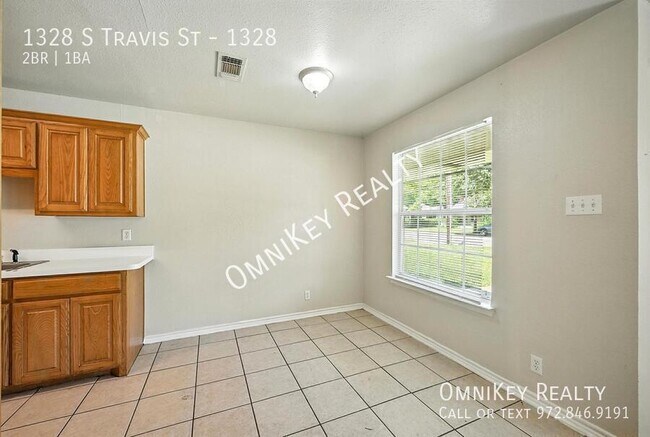 Foto del edificio - 1328 S Travis St