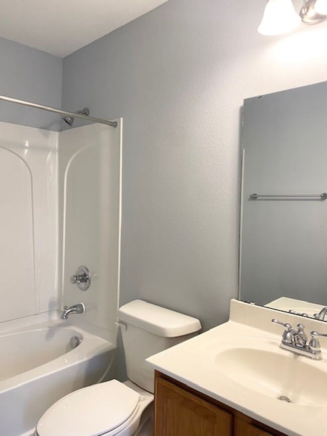 Building Photo - TWO BEDROOM GARDEN HOME IN GATED COMMUNITY