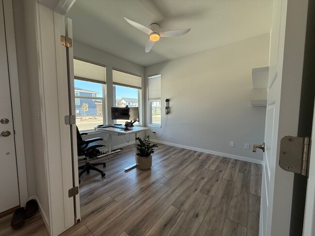 Building Photo - Stunning Luxury Living in Coal Creek with ...