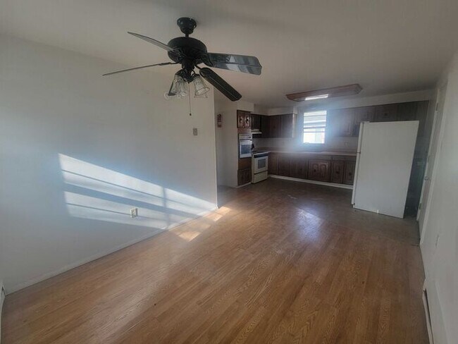 Building Photo - Cozy 2-Bedroom Home with Spacious Eat-In K...