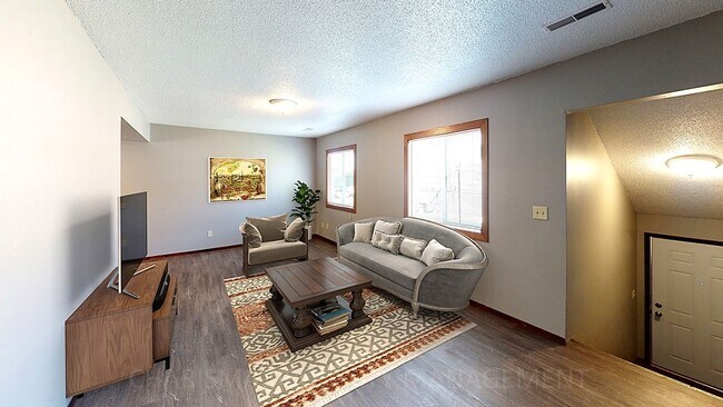 Building Photo - SPACIOUS TWO BEDROOM UNIT, LOCATED IN BRAN...