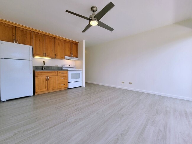 Building Photo - Available Now: A 1 Bedroom, 1 Bathroom Condo with 1 Assigned Parking Stall