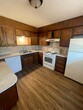 kitchen. al appliances come with apartment - 310 E Oklahoma Ave