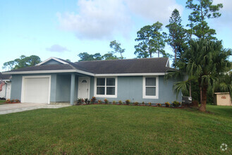 Building Photo - 6279 SE Poinciana Ln