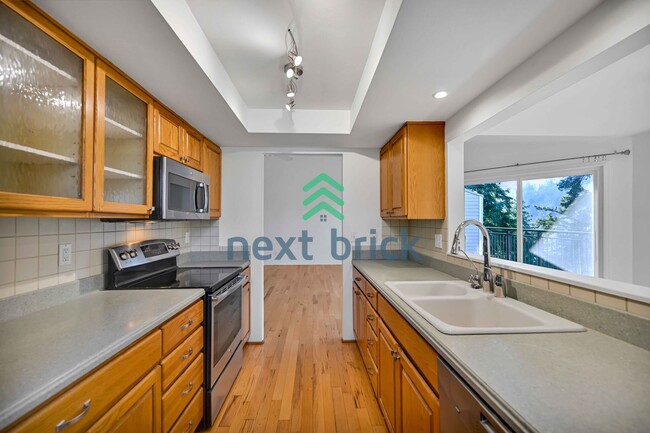 Building Photo - 3 BED & 1.75 BATH CONDO FOR RENT