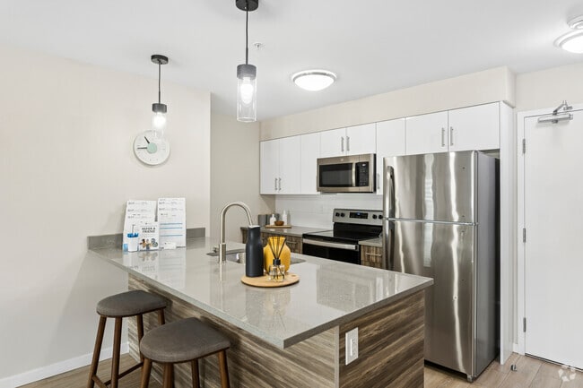 2BR, 2BA +Den - 944SF - Kitchen - G17 Apartments at Tamarack