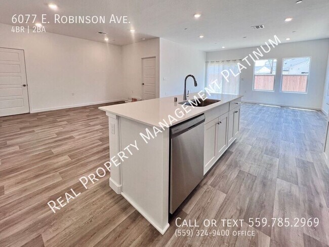 Foto del edificio - 6077 E Robinson Ave